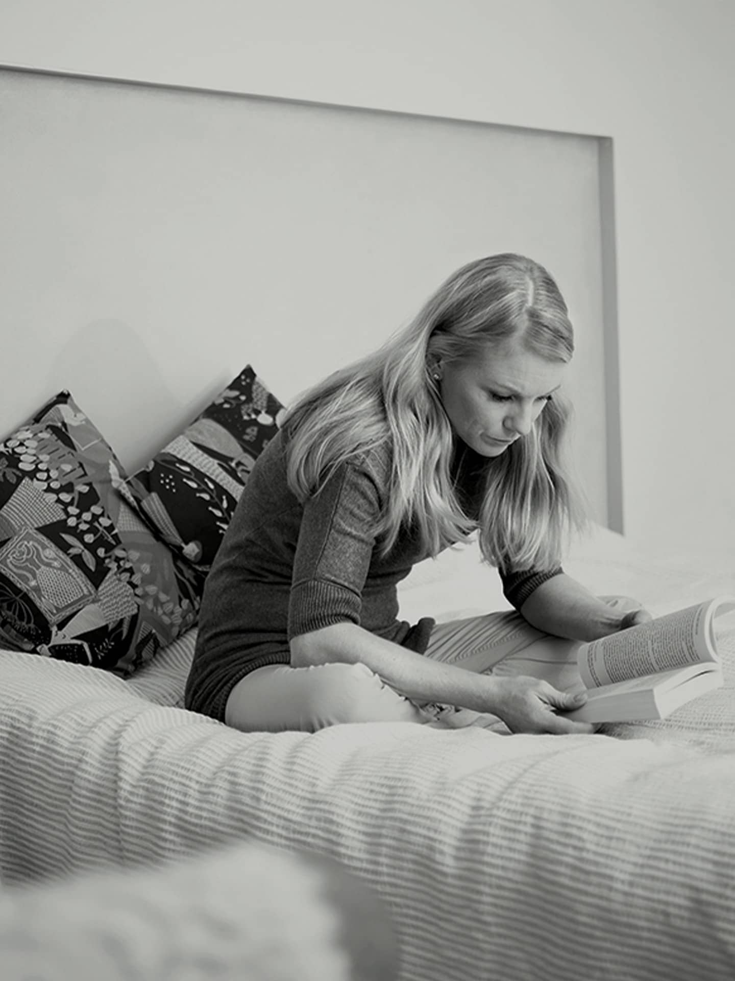 Academic bookstore brand imagery of woman reading